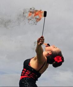 Katy Kartwheel solo circus acts, fire performer, circus artists, marlow, buckinhgamshire, event entertainer
